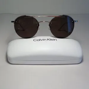 Calvin Klein | Accessories | Calvin Klein Ck233s Shiny Gold  display picture 1